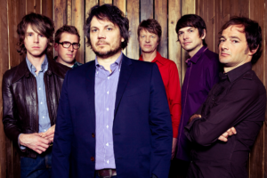 Photo of the band Wilco taken by Austin Nelson and Licenced by Creative Commons